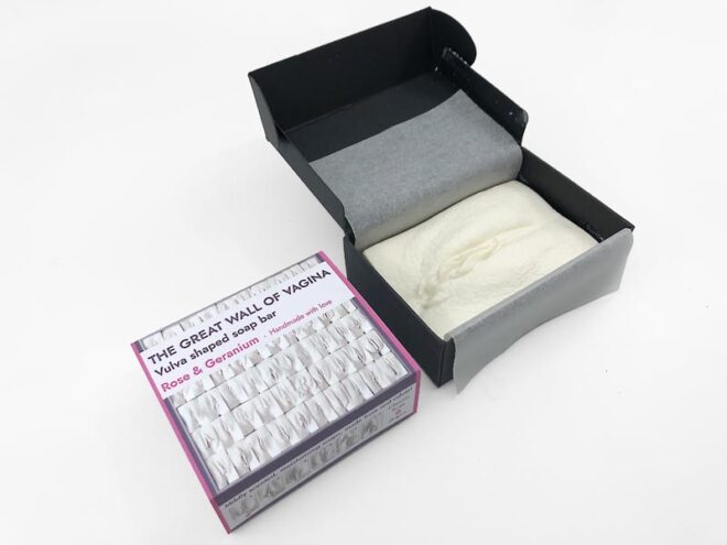 vulva shaped natural soap bar in eco-friendly packaging