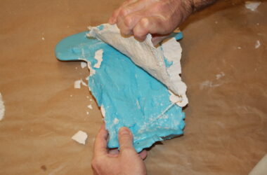 removing plaster bandage from a plaster vulva cast