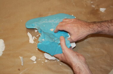 removing alginate mould from a plaster vulva cast