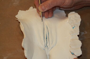 cleaning the surface of a plaster vulva cast